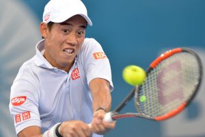 Kei Nishikori hits a backhand in his win over Jordan Thompson at the Brisbane International - PHOTO: Getty Images