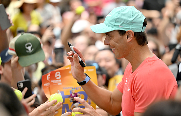 Rafael Nadal signs autographs for fans at Brisbane's Queen Street Mall. Picture: Tennis Australia