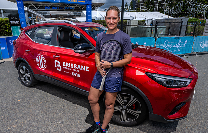 Sam Stosur with a MG car at the Queensland Tennis Centre. Picture: Tennis Australia