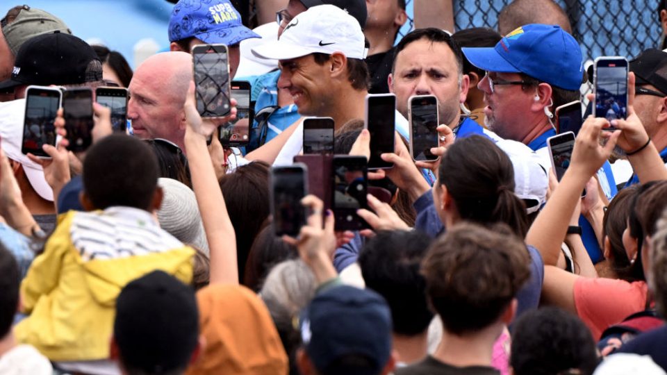 Rafael Nadal walks through crowds of adoring fans at the Queensland Tennis Centre. Picture: Getty Images
